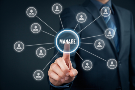 Manager click on button with text manage. Managerial business concept.の写真素材