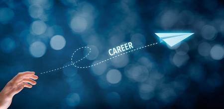 Career acceleration concept, personal development, personal growth. Businessman throw a paper plane symbolizing acceleration of career. Wide banner composition with bokeh in background.の写真素材
