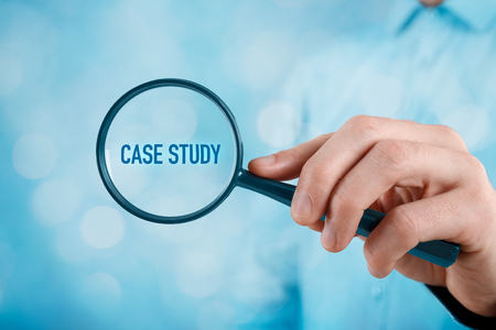 Businessman focused on case study. Businessman enlarge handwritten text case study.