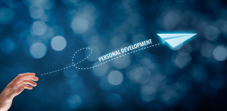 Personal development, personal and career growth, progress and potential concepts. Businessman throw a paper plane symbolizing personal development.の写真素材