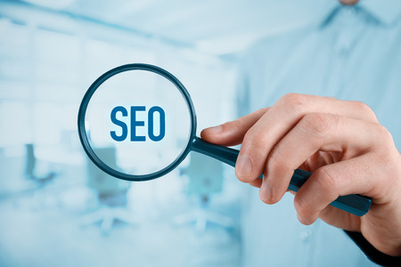 Focused on SEO concept. Businessman is focused to improve SEO and web traffic.の写真素材