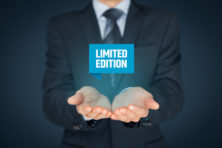Limited edition concept - exclusive business model and marketing offer. Businessman hold virtual label with text limited edition.の写真素材