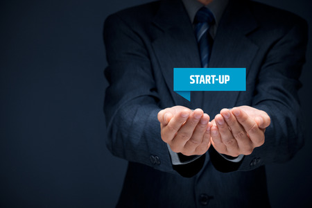 Start-up business concept. Businessman hold virtual label with text start-up.
の写真素材