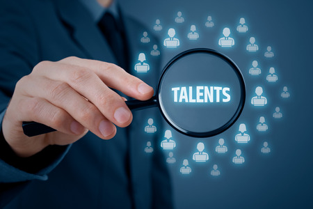 Human resources or headhunter search talented programmers and software developers.の写真素材