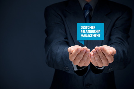Customer relationship management (CRM) concept. Businessman hold virtual label with Customer Relationship Management text.
の写真素材