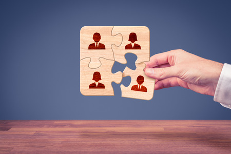 Assemble a team concept. Business team, human resources cooperation, connection and unity concepts. Good team fit together like puzzle pieces.の写真素材