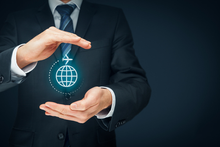 Travel insurance and business travel concepts. Insurance agent or businessman with protective gesture and icon of plane and globe. Left composition.
の写真素材