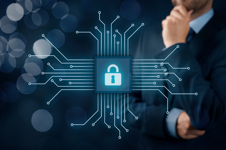 Information technology devices security concept. Businessman think about IT security - button with padlock icon in simplified design of chip connected with abstract devices represented by points.の写真素材