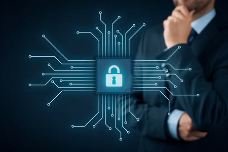 Information technology devices security concept. Businessman think about IT security - button with padlock icon in simplified design of chip connected with abstract devices represented by points.の写真素材