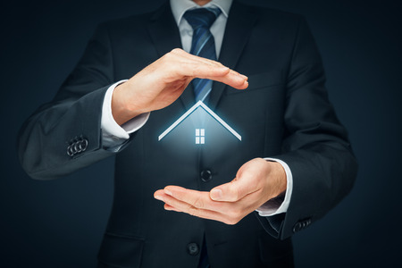 Real estate agent offer house. Property insurance and security concept.の写真素材
