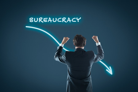 Bureaucracy reduction concept. Businessman celebrate bureaucracy reduction.の写真素材