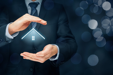 Real estate agent offer house. Property insurance and security concept.の写真素材