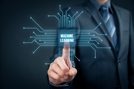 Machine learning data analysis concept. Businessman or programmer with abstract symbol of a chip with text machine learning connected with data represented by points.の写真素材