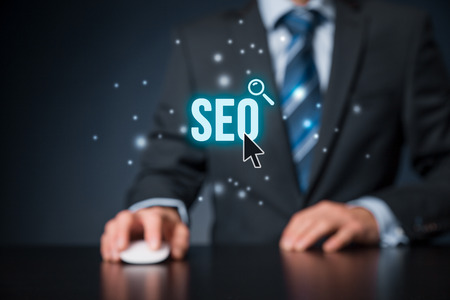 Search engine optimization - SEO concept. Businessman or programmer is focused to improve SEO and web traffic.の写真素材