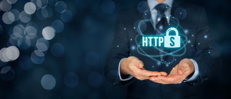 HTTPS - secured internet concept. Businessman or programmer offer https technology for www.の写真素材
