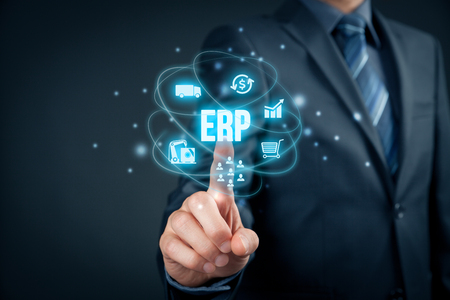 Enterprise resource planning ERP concept. Businessman click on ERP business management software button for collect, store, manage and interpret business data about customers, HR, production, logistics, financials and marketing.の写真素材