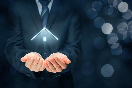 Real estate agent offer house. Property insurance and security concept.の写真素材