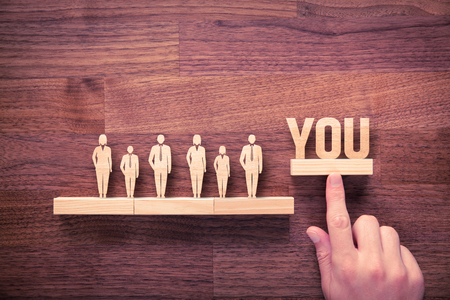 Successful team leader (manager, CEO, market leader) is you and another business leading and motivational concepts. Standing out from the crowd.の写真素材