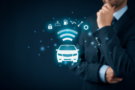 Intelligent car, intelligent vehicle and smart cars concept. Symbol of the car and information via wireless communication about security, parking location, fuel, drive analysis, service and car settings.の写真素材