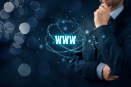 World wide web (www) - internet websites and SEO concepts. Businessman or programmer think about www.の写真素材