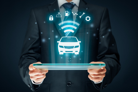 Intelligent car, intelligent vehicle and smart cars concept. Symbol of the car and information via wireless communication about security, parking location, fuel, drive analysis, service and car settings.の写真素材