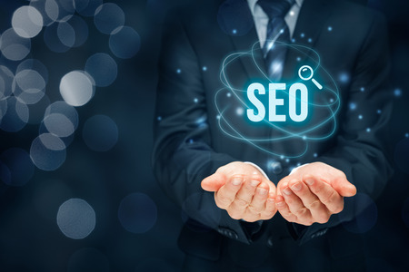 Search engine optimization - SEO concept. Businessman or programmer is focused to improve SEO and web traffic.の写真素材