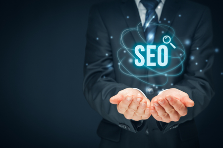 Search engine optimization - SEO concept. Businessman or programmer is focused to improve SEO and web traffic.の写真素材