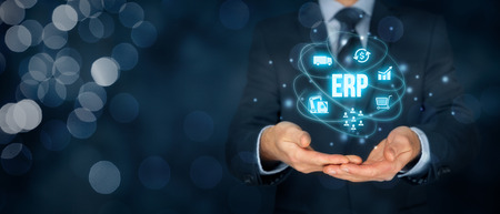 Enterprise resource planning ERP concept. Businessman offer ERP business management software for collect, store, manage and interpret business data about customers, HR, production, logistics, financials and marketing.の写真素材