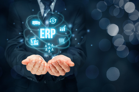 Enterprise resource planning ERP concept. Businessman offer ERP business management software for collect, store, manage and interpret business data about customers, HR, production, logistics, financials and marketing.の写真素材