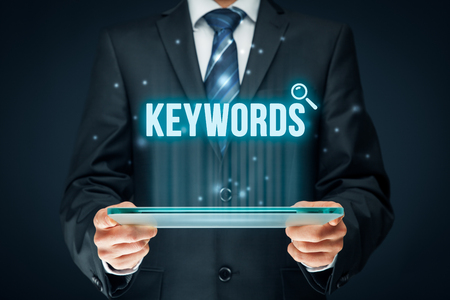 Find keywords - SEO and SEM concept. Marketing specialist offer keywording services.の写真素材