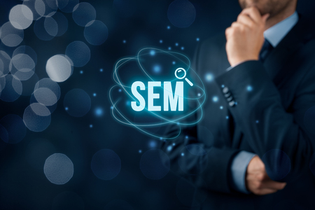 Search engine marketing - SEM concept. Businessman or programmer is focused to improve SEM and web traffic.の写真素材