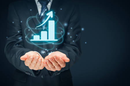 Business growth analysis concept. Businessman plan growth and increase of positive indicators in his business.の写真素材
