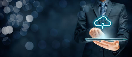 Cloud computing concept - connect devices to cloud. Businessman or information technologist with cloud computing icon.の写真素材