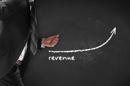 Increase revenue concept. Businessman (manager, coach, leadership) hurry to increase revenue.の写真素材