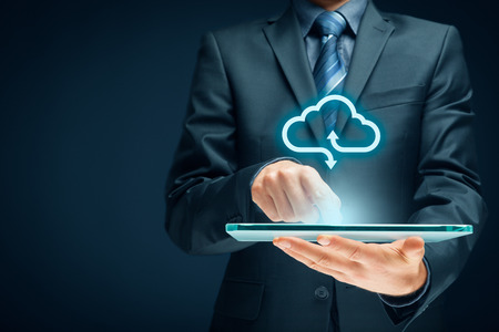 Cloud computing concept - connect devices to cloud. Businessman or information technologist with cloud computing icon.の写真素材