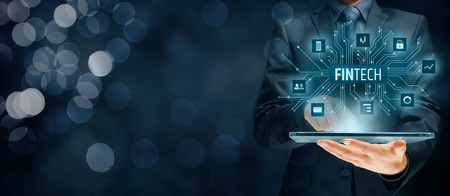 Fintech (financial technology) concept. Business person with tablet and fintech illustration.