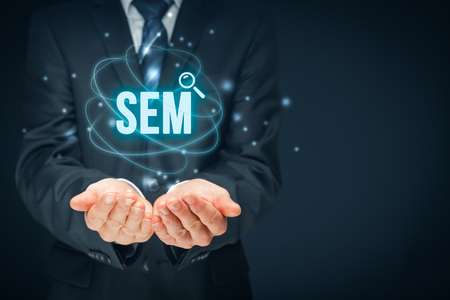 Search engine marketing - SEM concept. Businessman or programmer is focused to improve SEM and web traffic.の写真素材