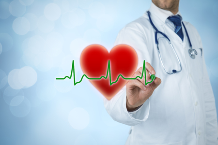 Healthcare and heart problems prevention (cardiology) concept. Cardiologist or general practitioner doctor and symbol of the heart and ECG heartbeat.の写真素材