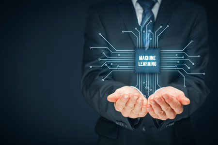 Machine learning data analysis concept. Businessman or programmer with abstract symbol of a chip with text machine learning connected with data represented by points.の写真素材