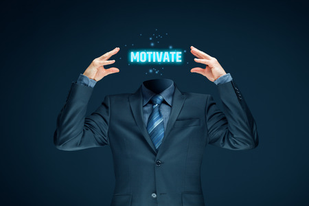 Motivation improvement concept. Businessman with word motivate in place of a head.の写真素材