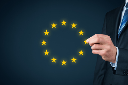 European union disintegration concept. Politician populist remove star from EU symbol (brexit, grexit, czexit, frexit, italexit and similar).の写真素材