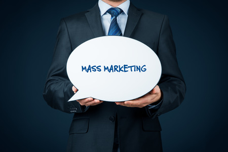 Mass marketing concept. Marketing specialist hold bubble speech with text mass marketing.の写真素材