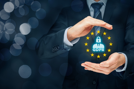 GDPR (general data protection regulation) concept. Businessman or IT technologist with text GDPR, person with lock instead of head and EU stars.の写真素材