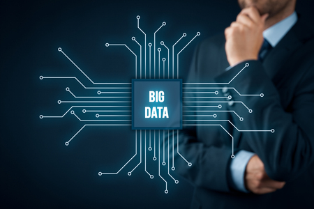 Big data analysis concept. Businessman or IT specialist with abstract symbol of a chip with text big data.の写真素材