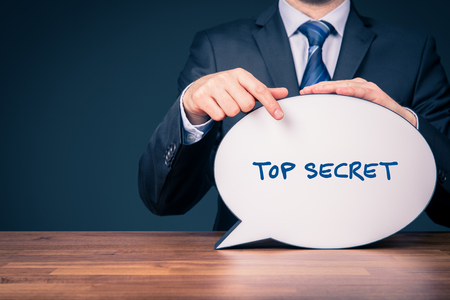 Top secret concept - businessman with speech bubble representing communication.の写真素材