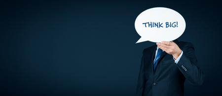 Think big business motivational concept. Businessman motivate to big goals.の写真素材
