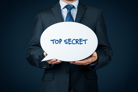 Top secret concept - businessman with speech bubble representing communication.の写真素材
