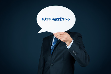 Mass marketing concept. Marketing specialist hold bubble speech with text mass marketing.の写真素材