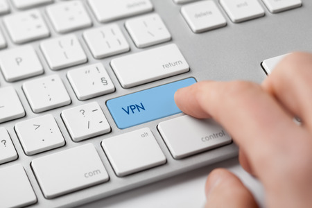 Computer user connected via virtual private network. Private network security concept.の写真素材