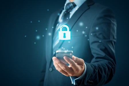 Smart mobile phone (cellphone) security concept. Person with smart phone and symbol of a padlock.の写真素材